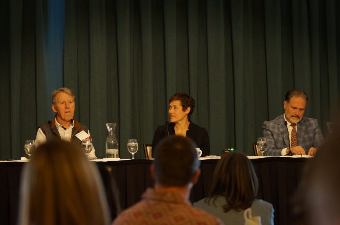 From left: panelists Randy Alexander, CEO of Torque Companies; Heather Stouder, administrative services manager at the city of Madison's Department of Planning and Community and Economic Development; and Greater Madison Chamber of Commerce President Zach Brandon. The three panelists, along with Veridian Homes President Chris Ehlers, spoke on the housing panel at IB Madison's Real Estate & Construction Symposium.