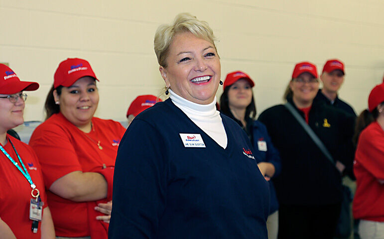 Jane Blain Gilbertson, president & CEO of Blain’s Farm & Fleet, at the 2013 grand reopening of the retailer’s West State Street store in Rockford, Ill.