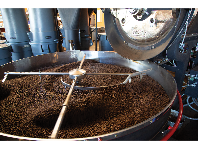 A coffee roaster's cooling tray cools down beans after a roast at Wonderstate's Viroqua headquarters.