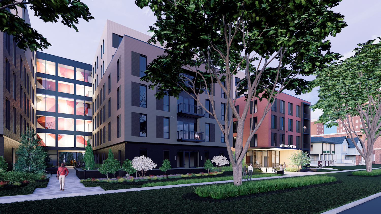 The project adds a new pedestrian connection through the site and integrates residential elements such as porches, balconies and patios.