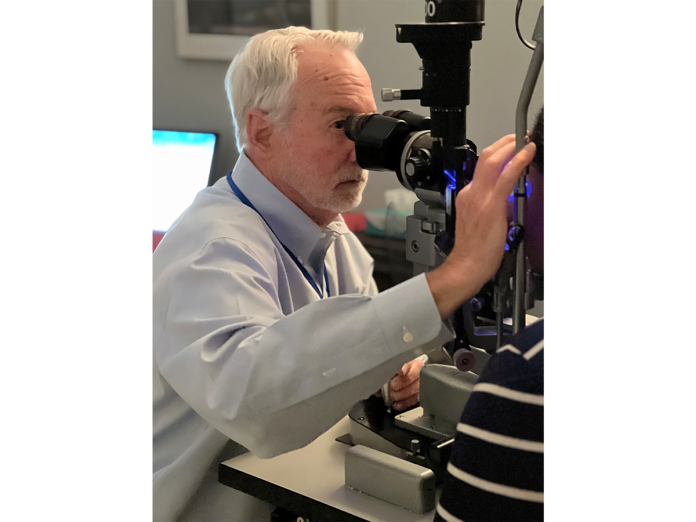 Dr. Neal Barney, ophthalmology, volunteers at the Specialty Care Free Clinic.