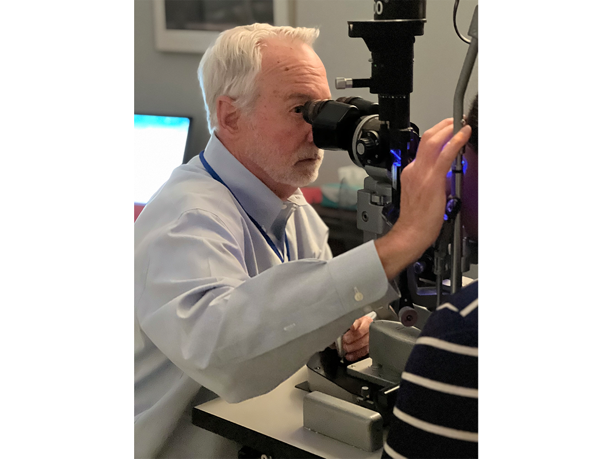 Dr. Neal Barney, ophthalmology, volunteers at the Specialty Care Free Clinic.