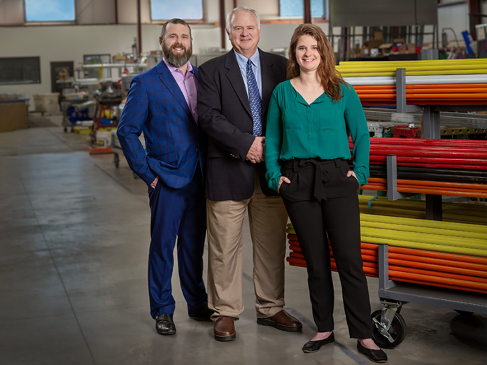 John Westphal (center) flanked by son Fritz Westphal and daughter Maiken Westphal