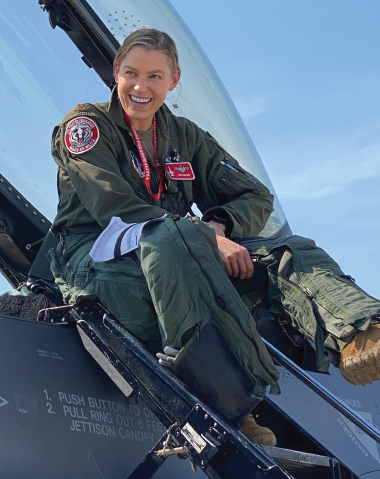 Zoe Davies emerges from an F-16. This spring, she will begin training on the F-35, a much more technologically advanced fighter jet.