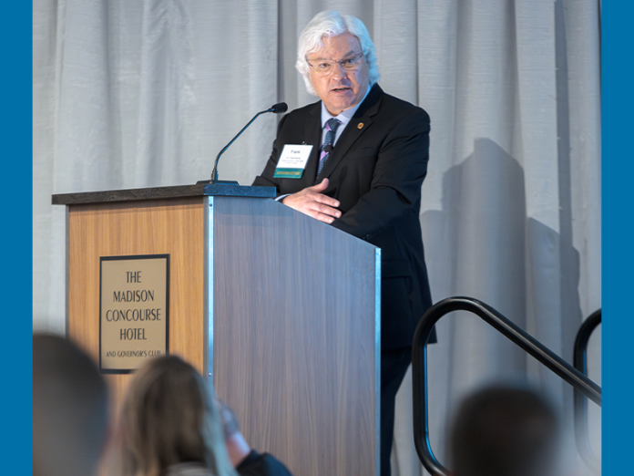 Scenes from the Health Care Summit: Moderator Frank Byrne, president emeritus of St. Mary’s Hospital in Madison, makes a point during a panel session.