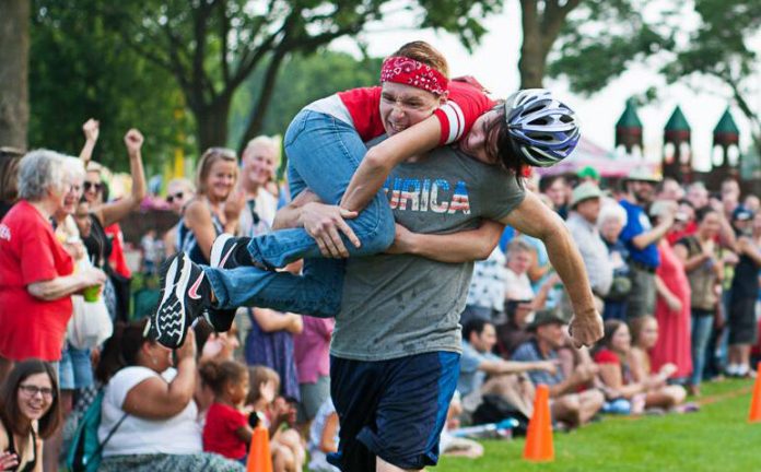 The Wisconsin Wife-Carrying Championship is a fan favorite at the annual Monona Community Festival.