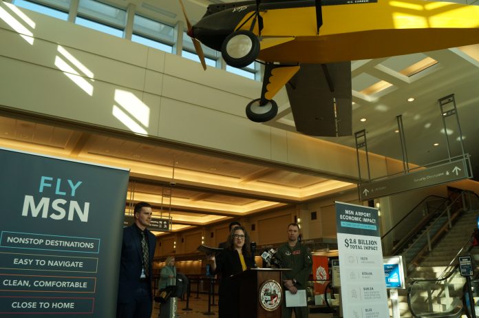 From left: Dane Country Regional Airport director Mark Papko and Dane County Executive Melissa Agard present economic impact information at a Feb. 18, 2026, media event.