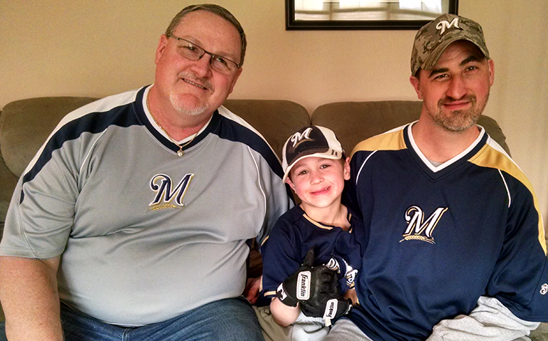 Three generations of Packards: Kevin Packard Sr., Kevin Packard III, and Kevin Packard Jr.