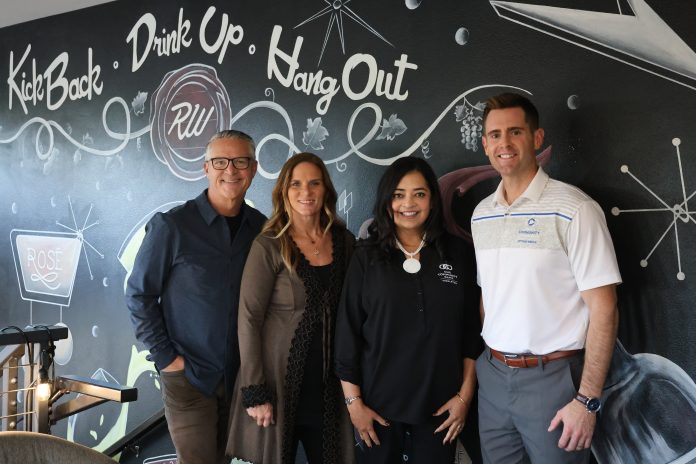 (From left) Mike and Kari Heller, owners of Red & White Winebar, and One Community Bank's Kay Gashette, VP–business banking officer, and Dan Carey, chief commercial officer