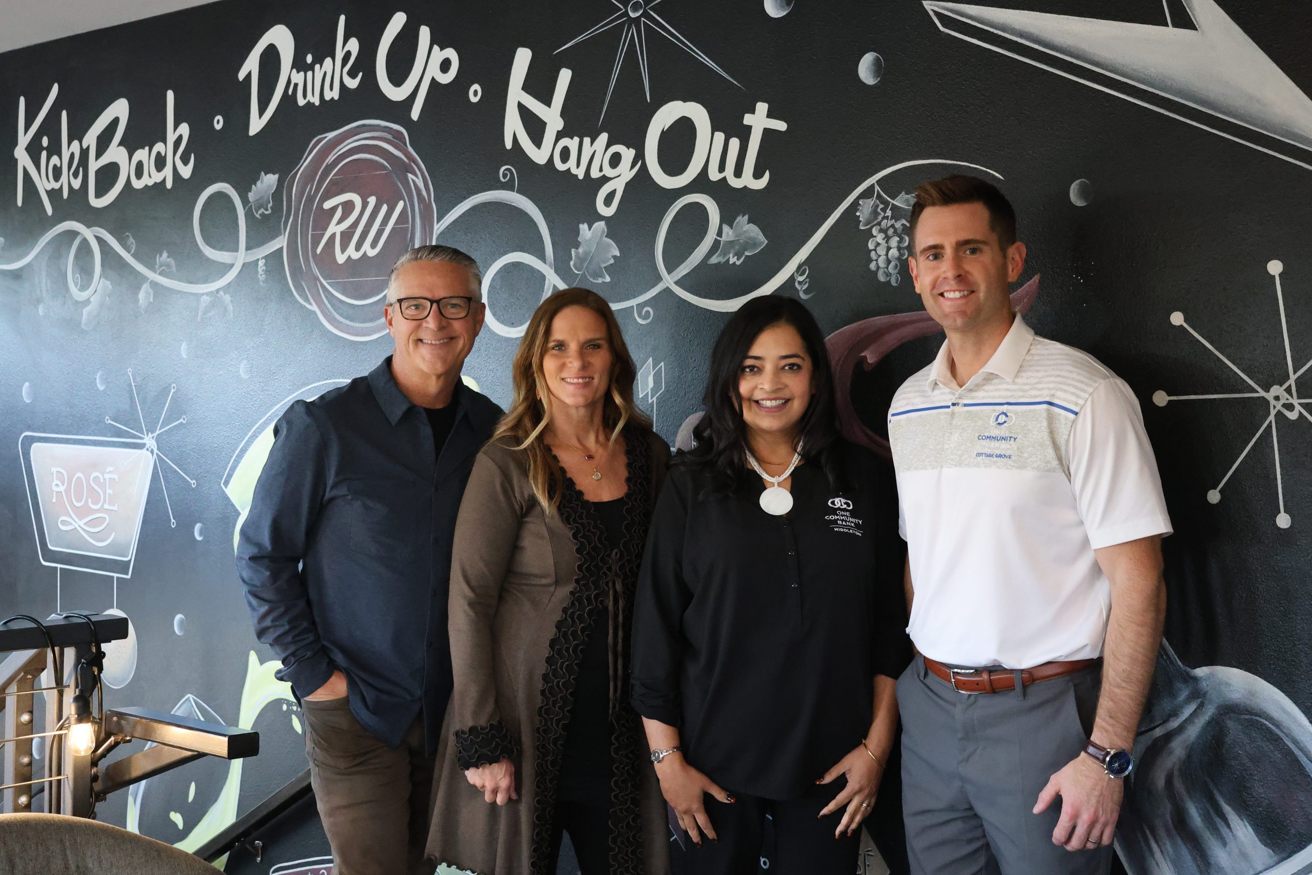 (From left) Mike and Kari Heller, owners of Red & White Winebar, and One Community Bank's Kay Gashette, VP–business banking officer, and Dan Carey, chief commercial officer