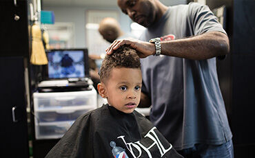 JP Hair Design’s annual back-to-school haircut program for kids typically draws about 250 youngsters.