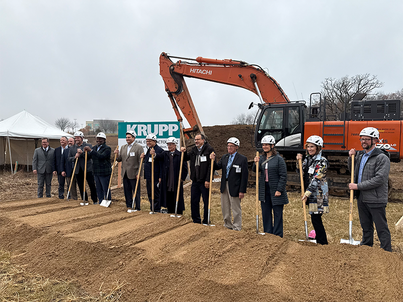 Public officials, representatives from Mandel Group and other members of the project team break ground on the 197-unit Element Collective workforce housing development in University Research Park on Nov. 20.