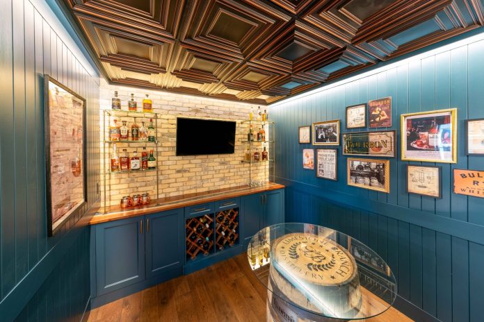 When JG Development moved into its new building, a former State Bank of Cross Plains, it transformed the bank vault into the company Speakeasy.