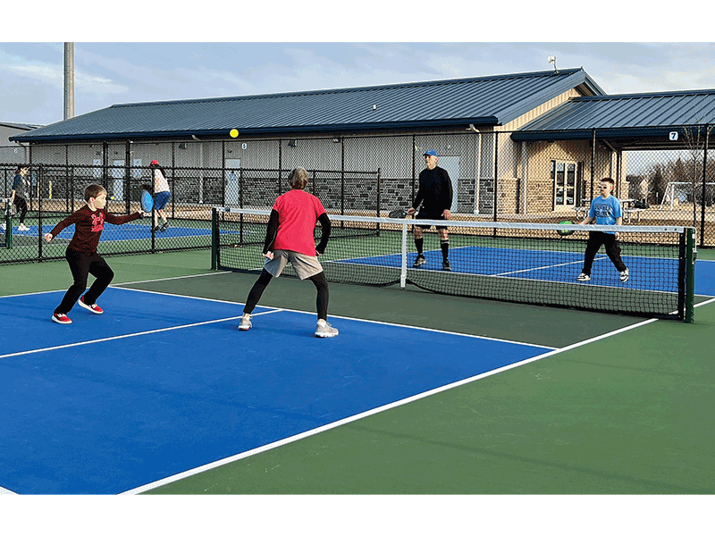 Pickleball’s changing age demographics can be seen on almost any court, like in McFarland where two 11 year olds played with their family.