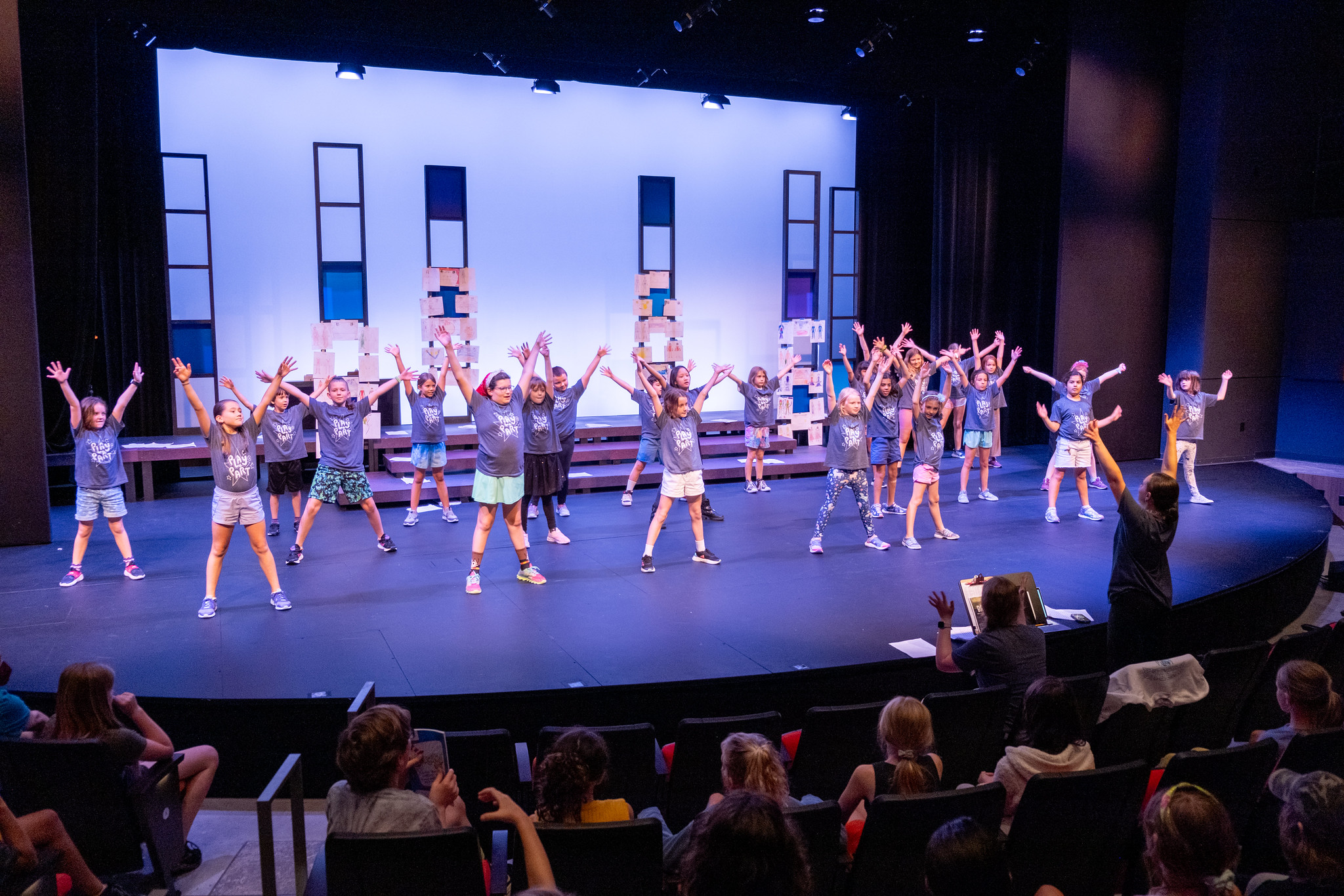 APR25_LetterfromtheEditorinChief_Kids on stage.jpg