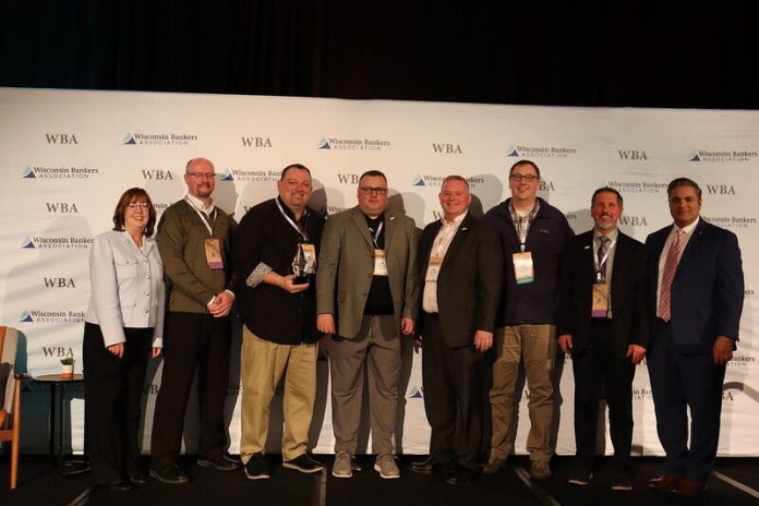 Bank of Sun Prairie's executive team accepting the Wisconsin Bankers Foundation's Financial Education Innovation award.