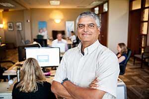 James Dias in the Wellbe Inc. office on Madison’s west side. “We want the technology to be completely transparent . The measures we try to focus on are how well the overall experience goes, not how many buttons you push.”
