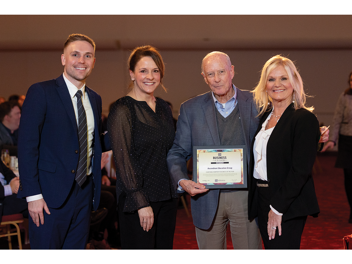 Richard D. George of Ascendium accepts their award.