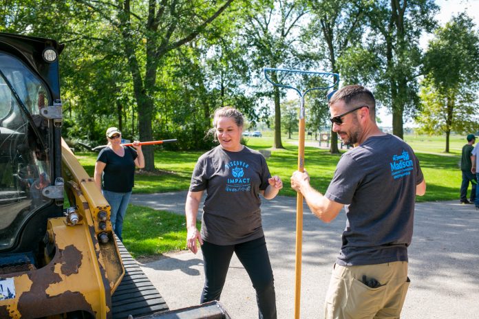 Madison Community Foundation employees plant trees at William G. Lunney Lake Farm County Park in Madison, Wisconsin on September 17, 2021.Beth Skogen Photography – www.bethskogen.com