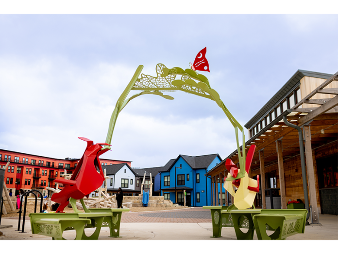 The Bayview development includes 57 modern townhouses, 73 apartments and a new community center.