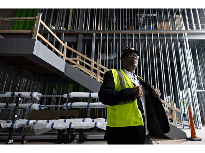 Alex Gee, CEO of the Center for Black Excellence and Culture, shows off space that will be used for receptions when the center opens in December 2025.