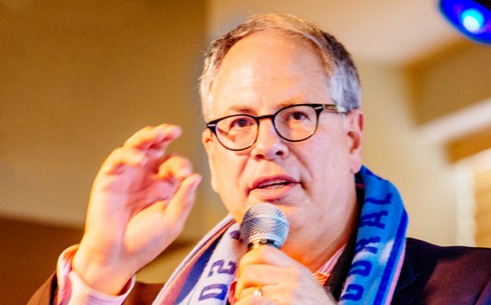 Forward Madison FC Managing Director Peter Wilt speaks at an executive luncheon hosted by the pro soccer team.
