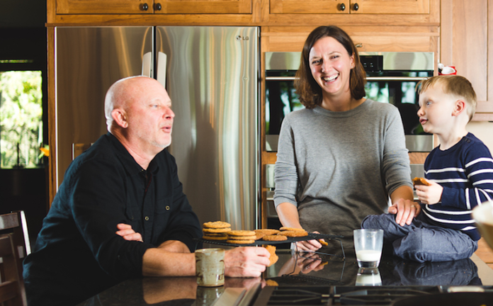 Leah Sugar (center) is the co-founder of HausLogic, a Madison company that produces and sells the AllSpice spice rack created by her brother, Max Osterhaus. Leah and Max were also part of Out of the Box Publishing, a former Madison board game publisher that their father, Mark Osterhaus (left), co-founded in 1998 and brought to prominence as the co-creator of…