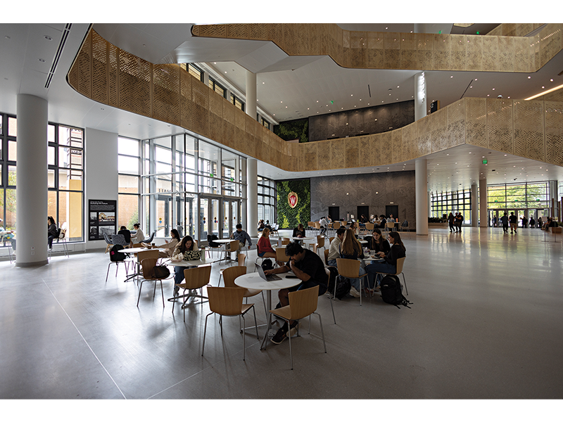 An open first floor with a cafe aims to draw in students and community members.