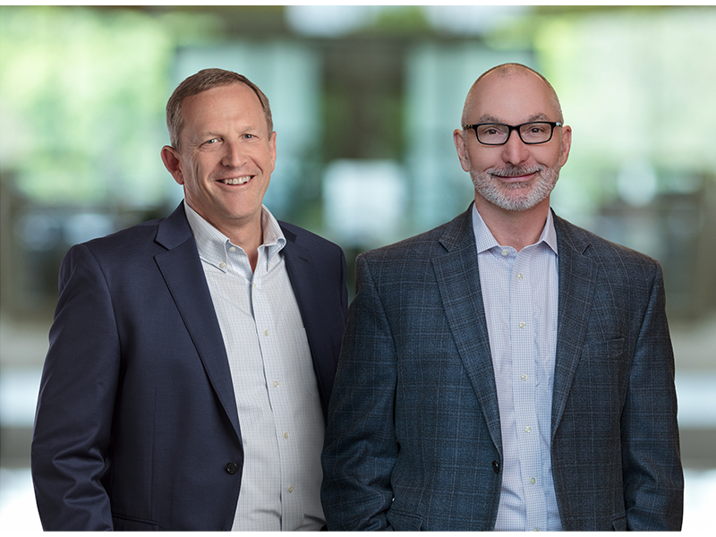 In May 2026, Dave Seiler (left) will succeed Corey Chambas (right) as CEO of First Business Financial Services Inc.