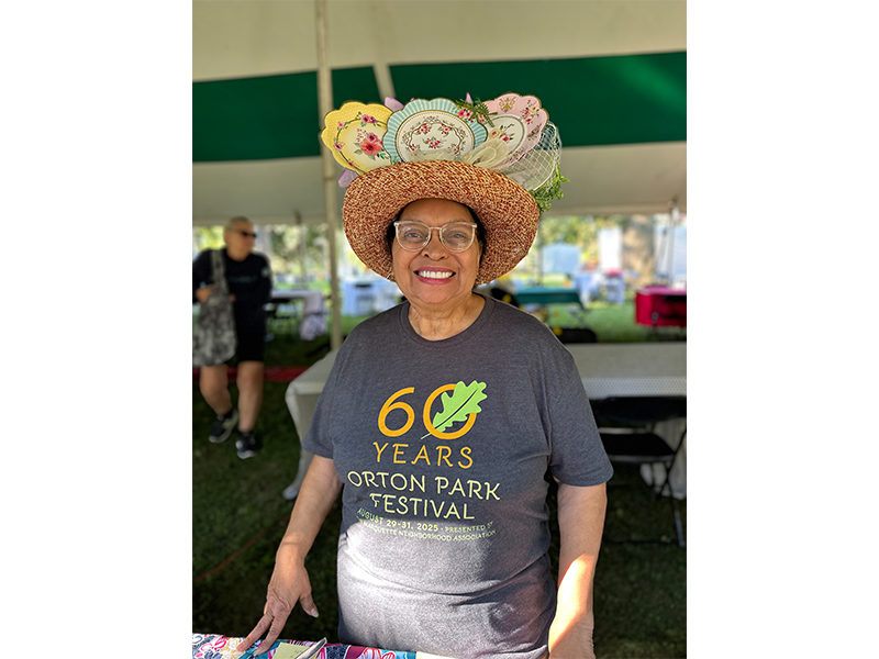 Wynona Pertel volunteers at the Orton Park Festival Jazz Brunch. Volunteers are critical to the success of the annual event.