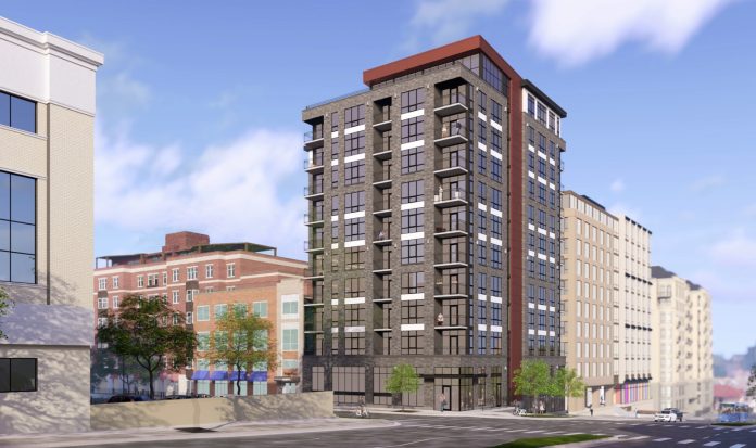 A rendering of the proposed 12-story building downtown that would house Capital Fitness and about 77 apartment units