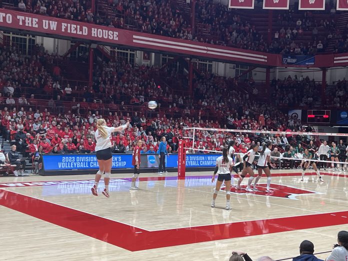 UW volleyball player Sarah Franklin serves during a December 2023 match at the UW Field House.