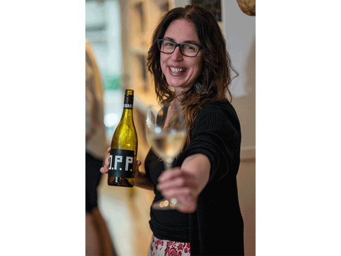 Sommelier MJ Hecox is the owner of GlouGlou, a wine bar at 11 N. Allen St., which shares its space with Cafe Domestique.