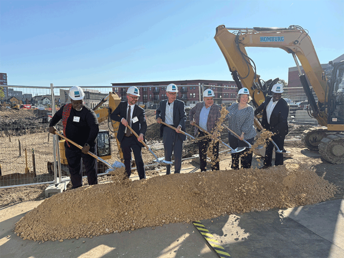 CDA board chair Claude Gilmore (left), CDA executive director Matt Wachter, Gov. Tony Evers, Rep. Mark Pocan, Madison Mayor Satya Rhodes-Conway, and WHEDA CEO and executive director Elmer Moore break ground on Phase 1 of the “Taking Shape, Our Triangle” project on Wednesday.
