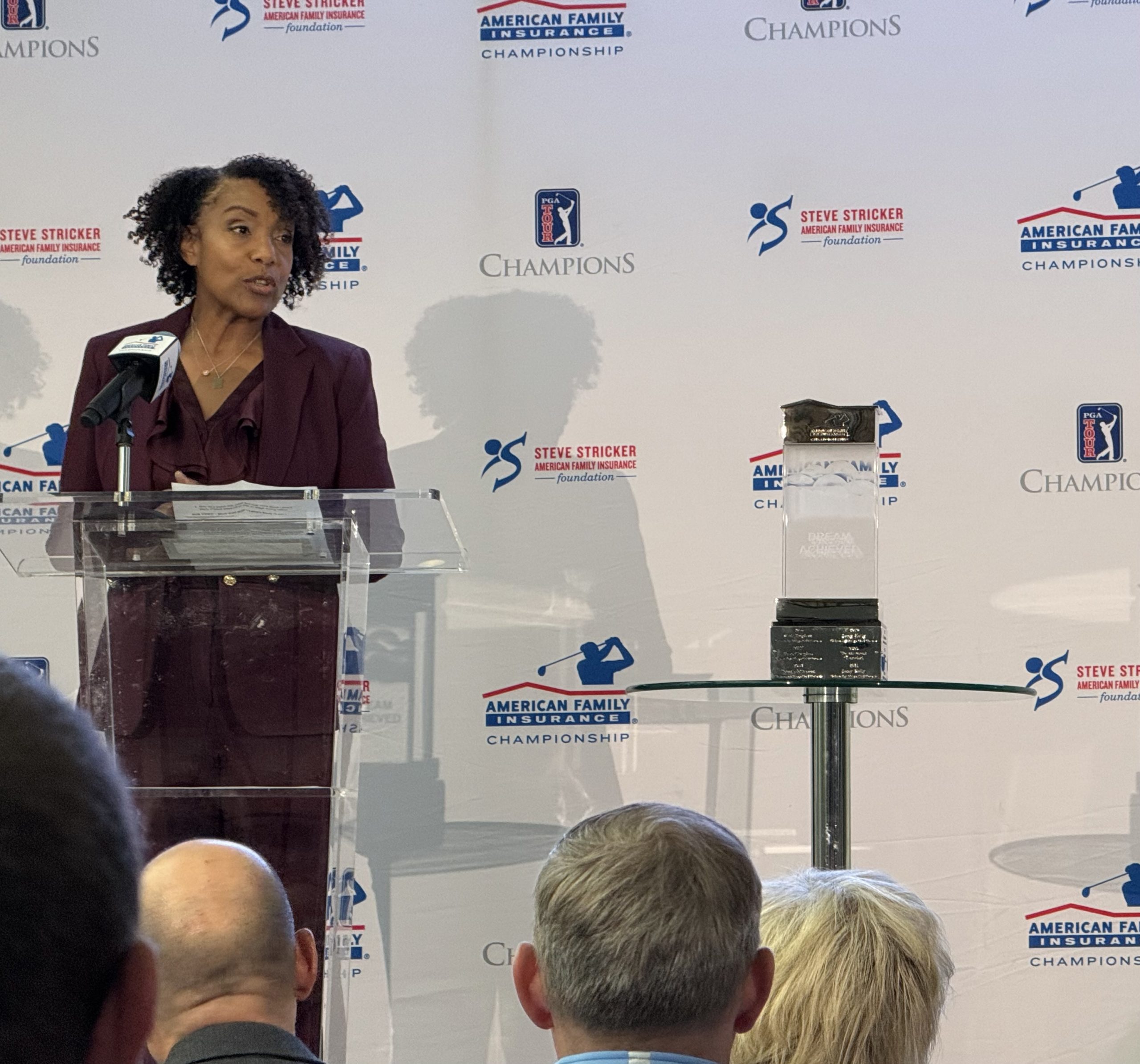 Telisa Yancy, American Family Insurance enterprise president and Steve Stricker American Family Insurance Foundation board president, thanks the organizations set to receive this year's tournament proceeds for their work in the community.