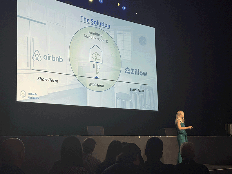 Christina Henderson, a current anesthesiology resident and co-founder of Reliable Residence, presents her pitch at the 2025 Pressure Chamber competition.
