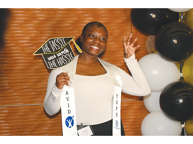 The tassle was worth the hassle: In the most recent academic year, AVID/TOPs graduates enjoyed a 100% college placement rate.
