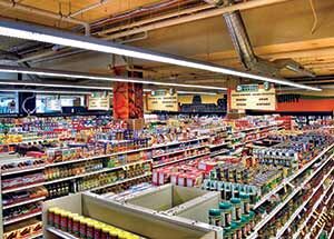 Grocery stores such as Fresh Madison Market are typically organized with nonperishable food items in the center and perishable items like meat, dairy, and produce around the periphery. Photo credit: Marla Bergh Photography