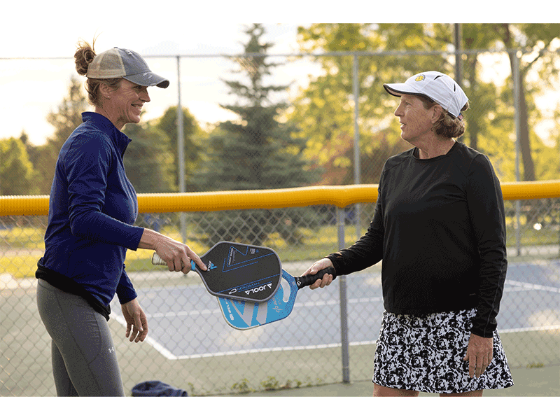 Keri Eull and Nancy Ketterhagen play pickleball to stay active and to stay social.