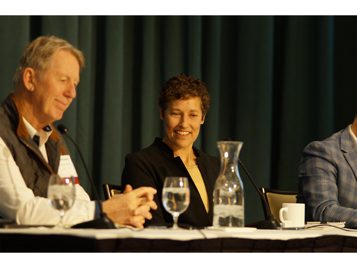 Panelists Randy Alexander and Heather Stouder discuss housing policy.