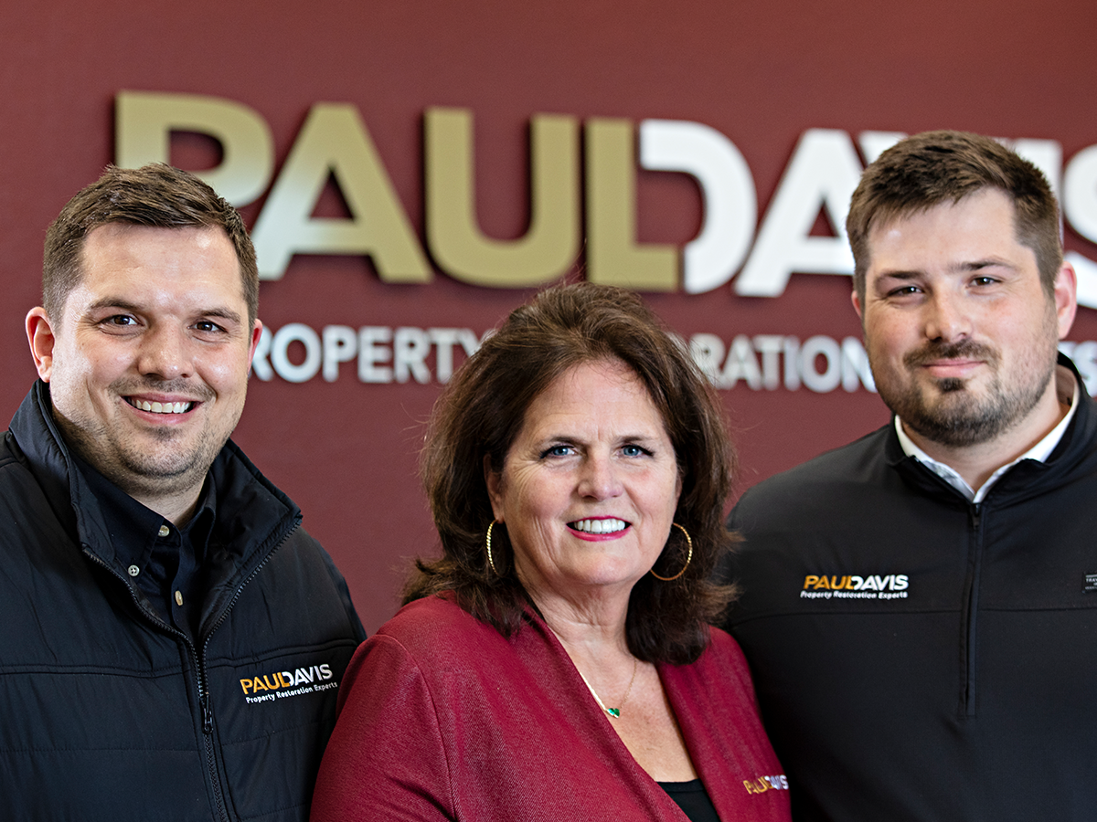 (From left) Jon, Connie and Alex Wuest run Paul Davis of South-Central Wisconsin as a mother-son(s) team.