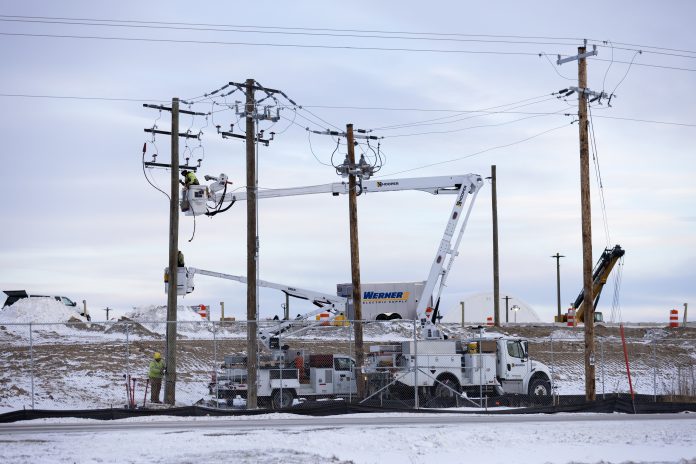 Construction is ongoing at the 350-plus-acre Beaver Dam Commerce Park where a Meta data center is being built, Jan. 20, 2026, in Beaver Dam, Wis. The state Public Utility Commission is weighing a proposal by Alliant Energy to determine how to distribute the costs of new infrastructure needed to meet high electricity demands from the data center. (Joe Timmerman / Wisconsin Watch)