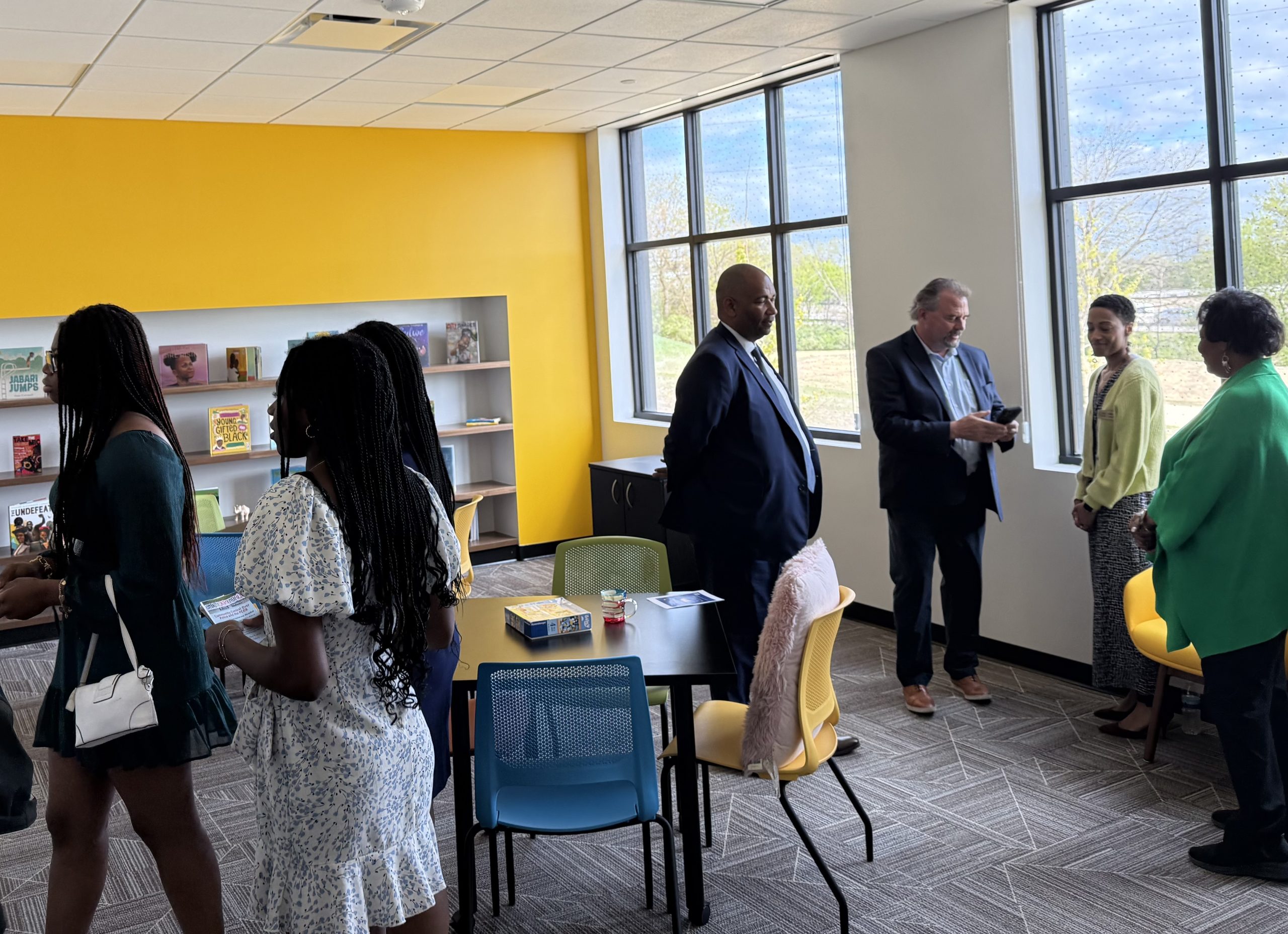 Lexi Gee (second from right) will lead the children's library at the Center to bolster youth literacy.