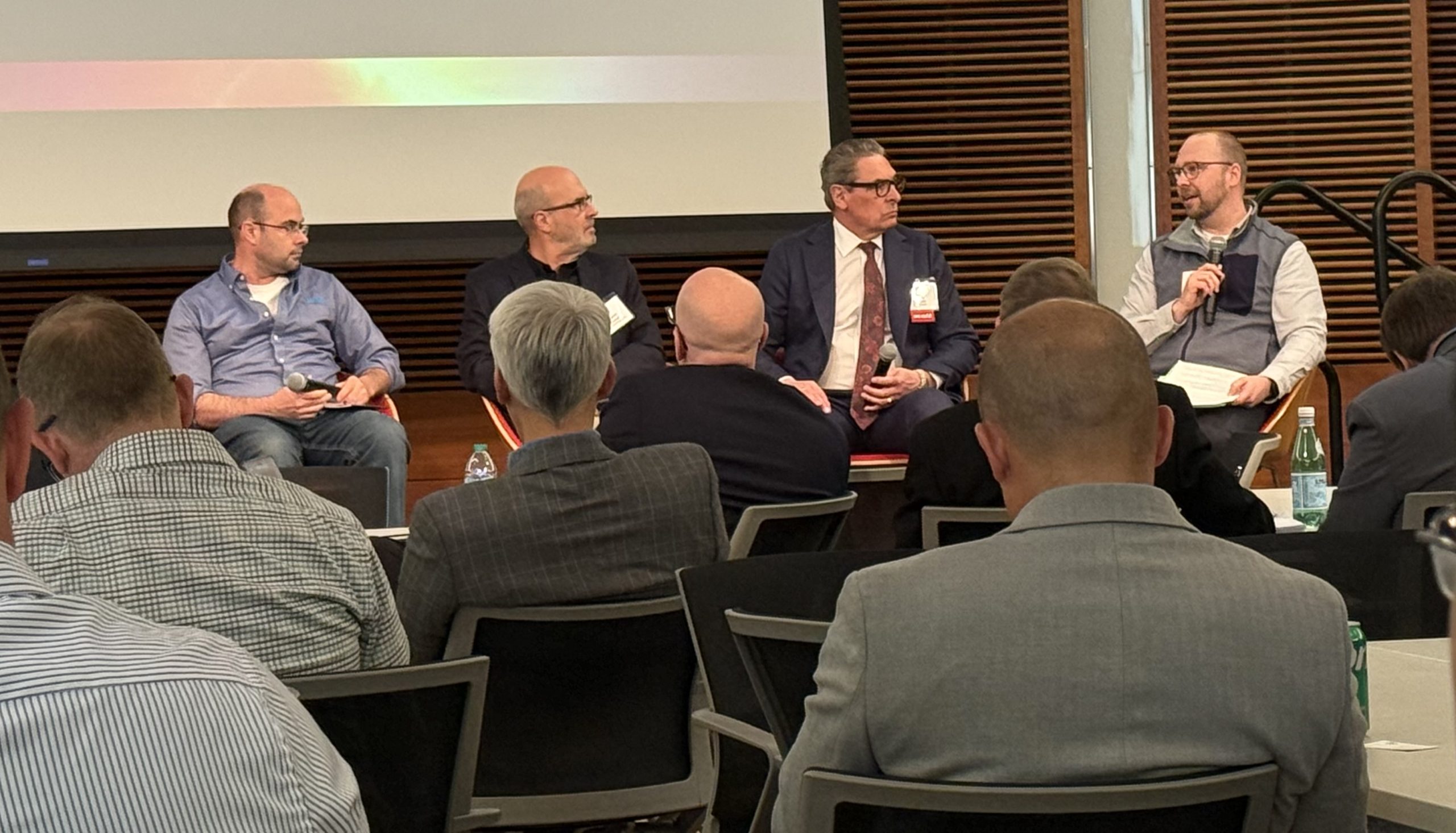 (From left) Ross Radel, Steve Nieland and Mark Chalmers discussed fusion's ability to meet growing global energy demands in a panel moderated by Kyle Crum (right).