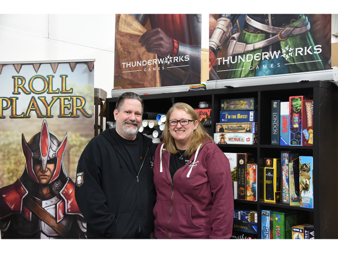 Keith Matejka, Thunderworks Games owner and designer, is pictured with his wife Claire, distribution and localization lead.