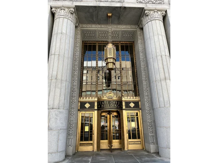 Landmark Development Services Company LLC plans to redevelop the building at 1 W. Wilson St., which could become the future site of an Amtrak train station.