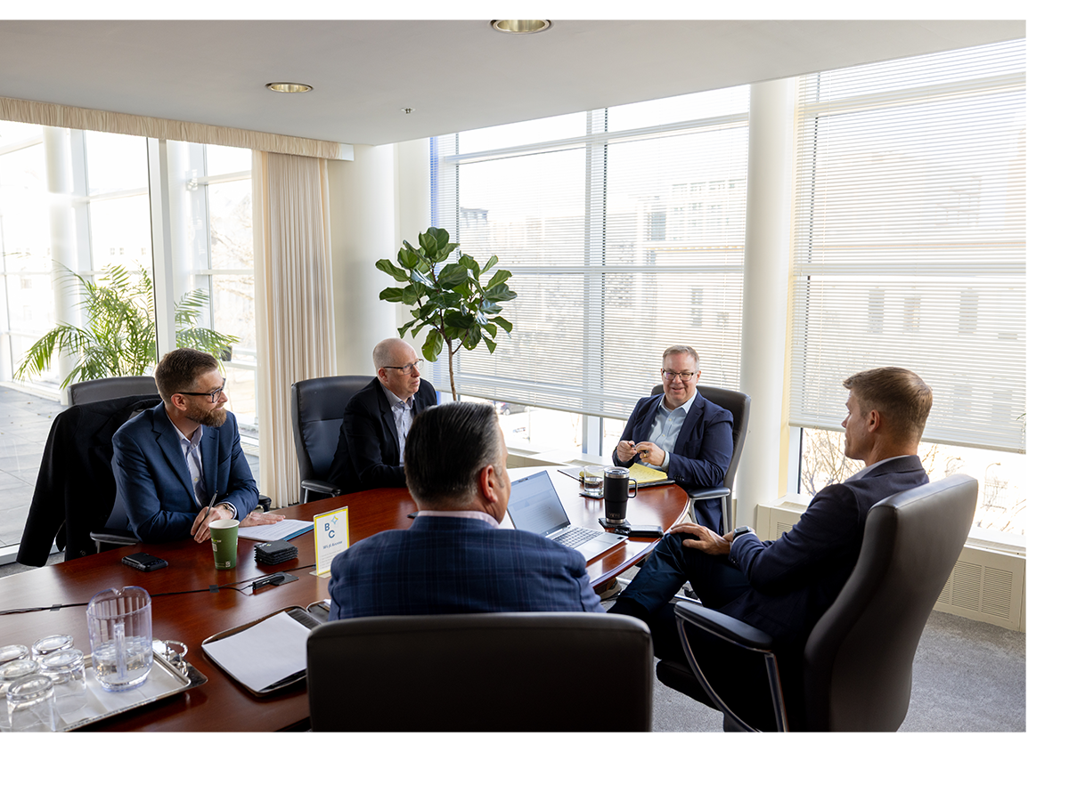 In Business moderator Michael Popke (center) leads the roundtable discussion with, clockwise from left, Christopher Tatge from DC Materials LLC, Jamie Radabaugh from Boardman Clark, Tim Cleary from Ideal Builders, and Patrick Baldwin from Advanced Building Corporation.