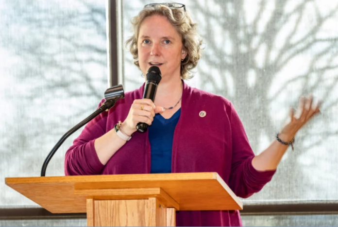 Mayor Satya Rhodes-Conway speaks at a podium.