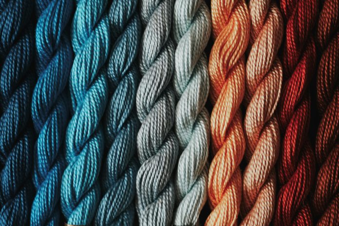 Different colored yarn laid side by side.