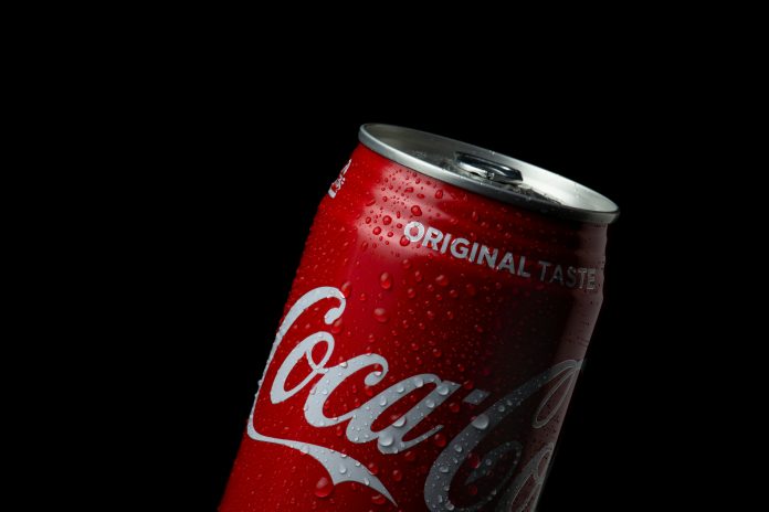 A can of Coca-Cola with a black background